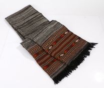 Indian shawl, in grey and black with multicoloured lozenges to the ends, 98c x 205cm