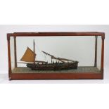 Victorian model of a Yarmouth Drifter, YH. 179, with folding main mast and figures on deck lifting a