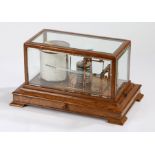 20th Century barograph, the oak case with bevelled glass and small frieze drawer