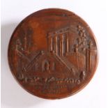 19th Century pressed wood snuff box, the circular cover with Italianate landscape scene inscribed "