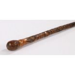 Japanese Meiji period bamboo walking stick, with carved figural and landscape decoration, 82.5cm