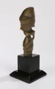 Tribal horn dagger handle, Possibly Malayan, the handle carved as a stylised figure, mounted on an