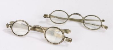 Two 19th Century silver spectacles with extending arms, mounted with lenses (2)