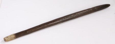19th Century African club, Pinka, South Sudan, the fur mounted pommel above a line carved handle,