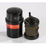 Curta Calculator Type II, No. 534553, in a black plastic drum case with lid