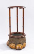 Victorian elephants foot umbrella and stick stand, the mahogany open circular and scroll carved