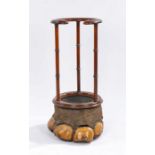 Victorian elephants foot umbrella and stick stand, the mahogany open circular and scroll carved