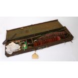 Canvas and leather mounted shotgun case, containing two cartridge belts and various cleaning rods (