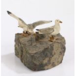 Early 20th Century cold painted bronze depiction of two seagulls on a rock outcrop, one with wings