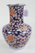 Japanese porcelain vase, 20th century, having cylindrical neck and bulbous body, with orange flowers