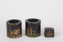 Pair of small Chinese wooden pots, each with gilded pagoda's and figures on a black lacquered