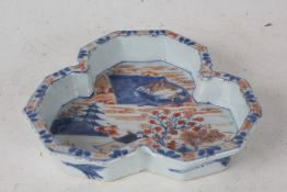 20th century Japanese Imari dish, of cloverleaf shape and decorated in the typical colours depicting