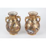 Pair of Japanese Satsuma vases, 20th century, each of baluster form with carrying handles and