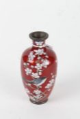 Japanese cloisonne vase, 20th century, decorated with a perched bird on a blossoming branch (some