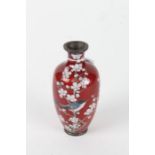 Japanese cloisonne vase, 20th century, decorated with a perched bird on a blossoming branch (some