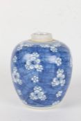 Chinese blue and white ginger jar, early 20th century, with white flowers on a blue ground (