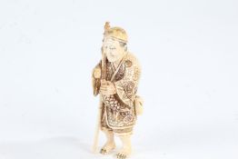 Japanese Meiji period carved ivory netsuke, in the form of a fisherman, with character mark (AF),