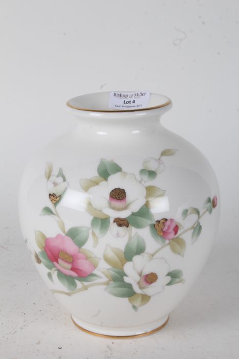 Japanese porcelain vase, the baluster body with white and pink flowers on a white ground,