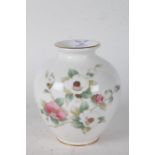 Japanese porcelain vase, the baluster body with white and pink flowers on a white ground,