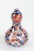 Japanese Meiji period double gourd vase, with imari decoration, 16cm high