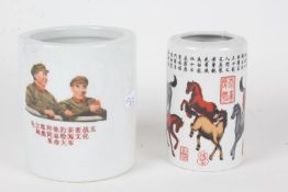 Two Chinese porcelain pots, the larger with two military figures, 13cm high, the smaller with