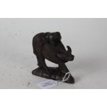 Eastern carved wooden figure group, 20th Century, in the form of a figure on a water buffalo, 11.5cm