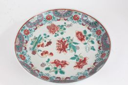 Large Chinese porcelain charger, the shallow dish with red and green flowers on a white ground,