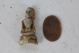 Chinese hardstone seal, carved in relief with an animal, 6.5cm wide, together with a carved