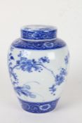 20th century Chinese blue and white porcelain jar and cover, transfer printed with flowers, 19cm