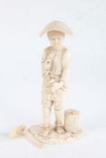 Japanese carved ivory okimono, Meiji period, in the form of a man holding various tools (AF), 21cm