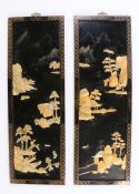 Pair of Chinese ebonised panels with raised mother of pearl depictions of trees, rocks and