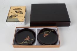 Japanese box and cover, 20th Century, the lift up lid depicting three fans on a gilt ground,