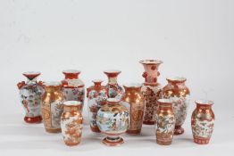 Collection of Japanese Kutani porcelain miniature vases, all decorated in iron red and gilt, the