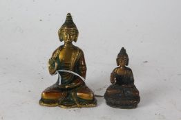 Two 20th century bronzed buddha's, in the form of Amoghasiddhi, the tallest 10.5cm (2)