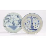 Two Chinese Qing Dynasty dishes, decorated to the centre with a tree and flowers to the sides,