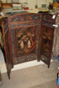 Early 20th century Japanese folding screen, the three part screen having pierced borders centred