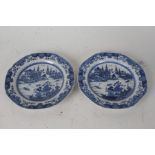 Pair of 19th century Chinese blue and white plates, each with pagoda's by a river within a