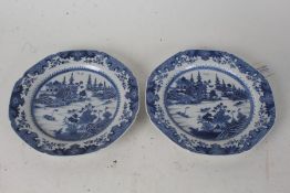 Pair of 19th century Chinese blue and white plates, each with pagoda's by a river within a