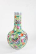 Chinese porcelain baluster vase, 20th century, with brightly coloured painted flowers and