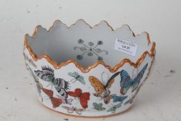 Chinese style porcelain bowl, with painted butterflies, 16.5cm wide