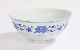 Chinese porcelain bowl, with a band of blue flowers on a white ground, character mark to base,