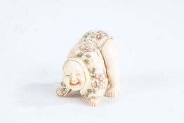 Japanese Meiji period carved ivory netsuke, in the form of a father and son, character mark to base,