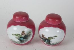 Pair of Chinese ginger jars, decorated with Pagoda's on a pink ground, each 11cm high