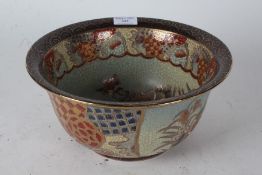 20th Century Japanese Satsuma bowl, painted with flowers on a crackled ground, 26cm diameter