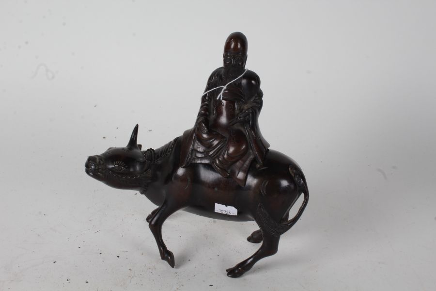 Chinese bronze censer, in the form of Du Fu on a water buffalo, 20th century, 23cm high