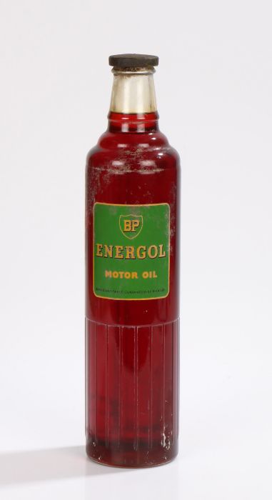 BP Energol Motor Oil glass bottle, with a green lapel to the front, with contents