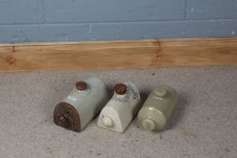 Three stoneware foot warmers, to include Doultons reliable foot warmer (3)