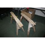 Two rustic trestles, the widest 96cm and 53cm high (2)