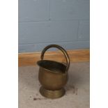 20th century brass spot hammered coal scuttle, with swing handle
