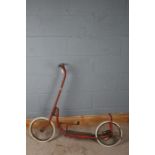 Child's Tri-ang scooter, painted in red